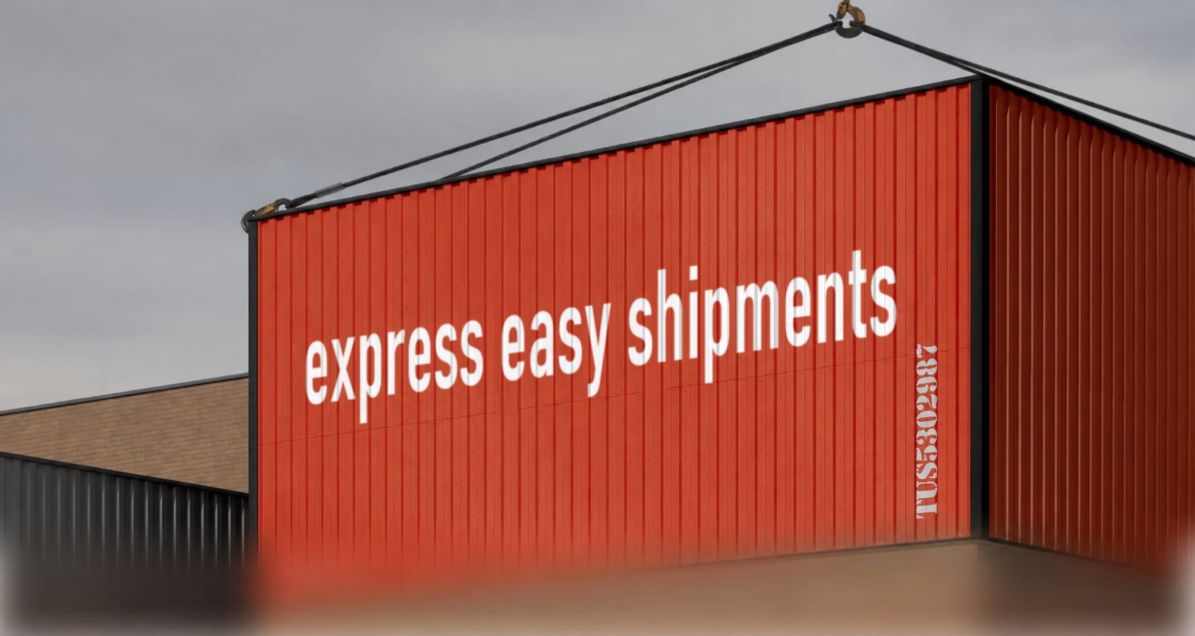 An Express Easy Shipments freight container being lifted by a crane